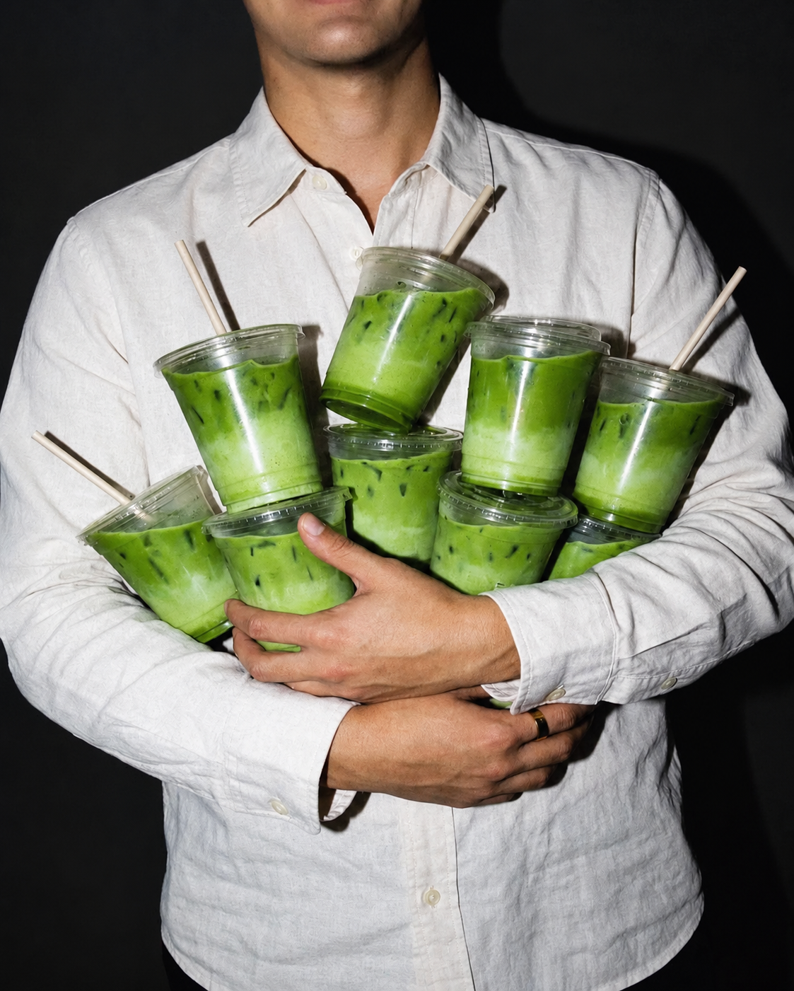Friends sharing iced matcha drinks